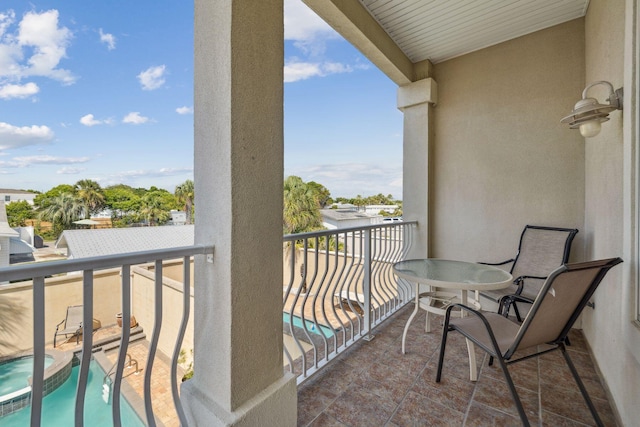 19108 Front Beach Rd Unit B, Panama City Beach, FL 32413 - balcony featuring view of pool and a pool with connected hot tub