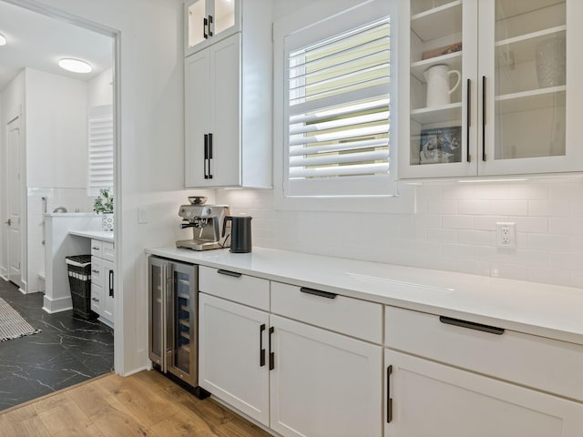 298 W Lafayette Rd, Watersound, FL 32461 - bar with wine cooler, backsplash, and dark wood finished floors