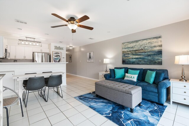 2606 Scenic Gulf Dr Unit 4206, Miramar Beach, FL 32550 - living area with ceiling fan and light tile patterned flooring