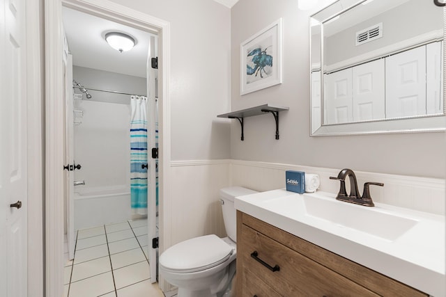 2606 Scenic Gulf Dr Unit 4206, Miramar Beach, FL 32550 - bathroom with vanity, wainscoting, tile patterned flooring, and shower / bath combo with shower curtain