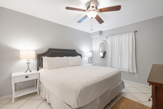 2606 Scenic Gulf Dr Unit 4206, Miramar Beach, FL 32550 - bedroom featuring light tile patterned floors and a ceiling fan