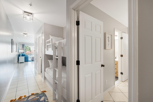 2606 Scenic Gulf Dr Unit 4206, Miramar Beach, FL 32550 - corridor featuring light tile patterned floors and baseboards