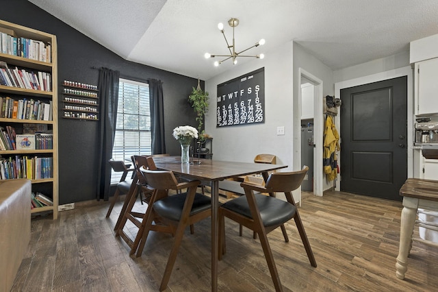 3774 Laird Rd, Crestview, FL 32539 - dining room featuring a chandelier, wood finished floors, and a textured ceiling