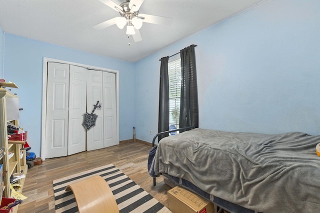 3774 Laird Rd, Crestview, FL 32539 - bedroom with wood finished floors, a closet, and a ceiling fan