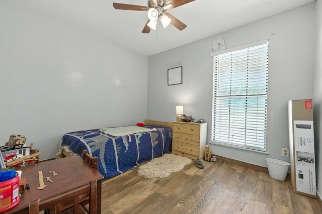 3774 Laird Rd, Crestview, FL 32539 - bedroom with wood finished floors and ceiling fan