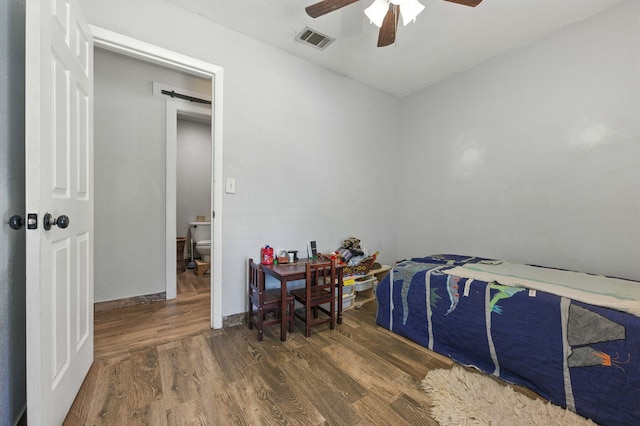 3774 Laird Rd, Crestview, FL 32539 - bedroom featuring wood finished floors and ceiling fan