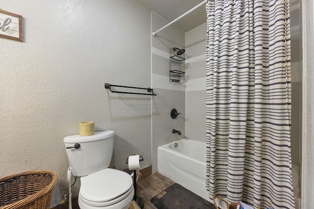 3774 Laird Rd, Crestview, FL 32539 - bathroom with a textured wall, shower / bath combo with shower curtain, and wood finished floors