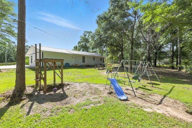 3774 Laird Rd, Crestview, FL 32539 - view of grassy yard with a playground
