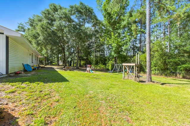 3774 Laird Rd, Crestview, FL 32539 - view of grassy yard featuring a playground