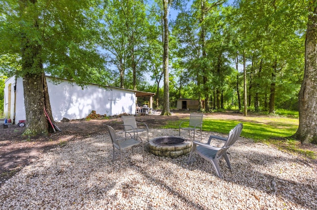 3774 Laird Rd, Crestview, FL 32539 - view of yard with an outdoor fire pit and an outdoor structure