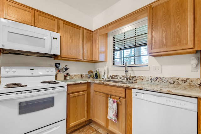 1090 5th Ave, Shalimar, FL 32579 - kitchen featuring white appliances and light stone counters