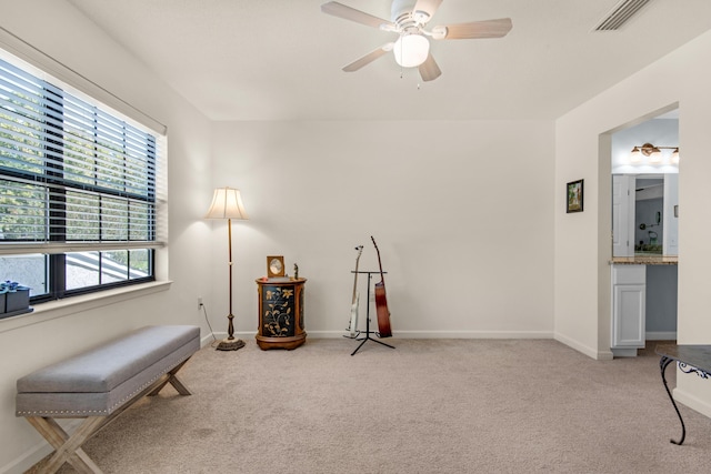 1090 5th Ave, Shalimar, FL 32579 - sitting room featuring light colored carpet and a ceiling fan