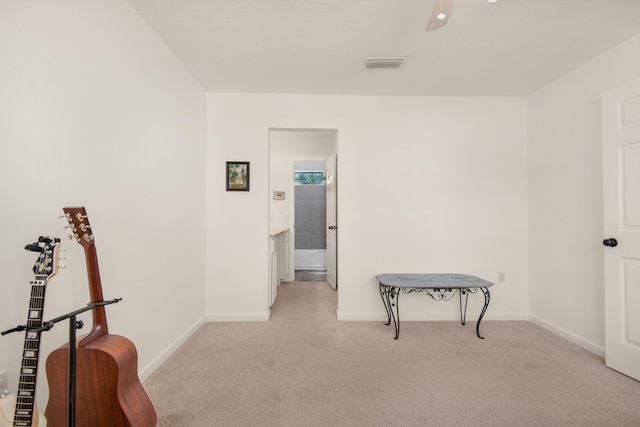 1090 5th Ave, Shalimar, FL 32579 - interior space featuring light carpet and ceiling fan