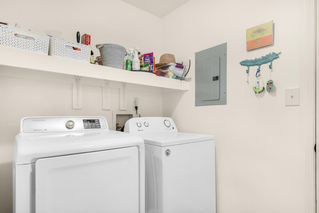 1090 5th Ave, Shalimar, FL 32579 - laundry area featuring washer and clothes dryer and electric panel