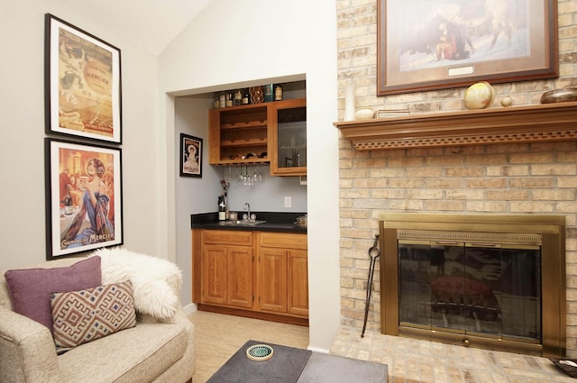 1262 Whitewood Way, Niceville, FL 32578 - living room with wet bar, lofted ceiling, and a fireplace