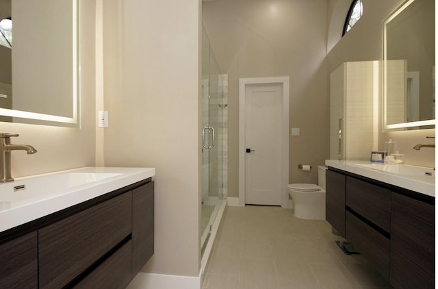 1262 Whitewood Way, Niceville, FL 32578 - bathroom with a shower stall, two vanities, and tile patterned flooring