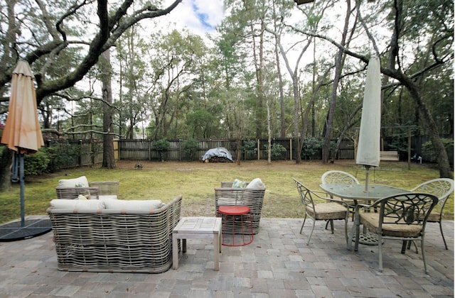 1262 Whitewood Way, Niceville, FL 32578 - fenced backyard featuring outdoor dining space, a patio, and outdoor lounge area