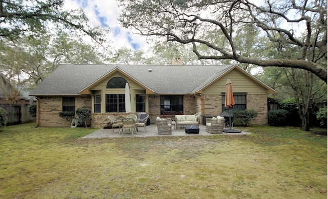 1262 Whitewood Way, Niceville, FL 32578 - rear view of house featuring brick siding, an outdoor hangout area, a chimney, and a patio area