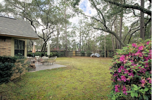 1262 Whitewood Way, Niceville, FL 32578 - fenced backyard with a patio area
