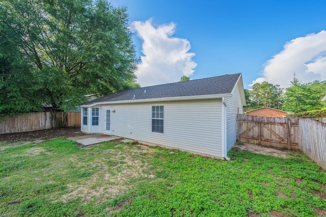 504 Shortwell Ave, Crestview, FL 32539 - rear view of property with a fenced backyard, a patio area, and a gate