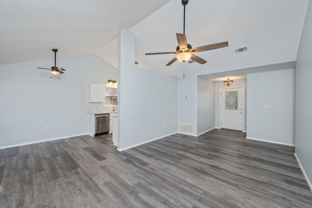 504 Shortwell Ave, Crestview, FL 32539 - unfurnished living room featuring ceiling fan, dark wood finished floors, and high vaulted ceiling