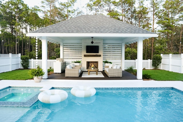 133 E Firethorn Cir, Inlet Beach, FL 32461 - view of pool featuring a gazebo, a fenced backyard, an outdoor living space with a fireplace, and a pool with connected hot tub