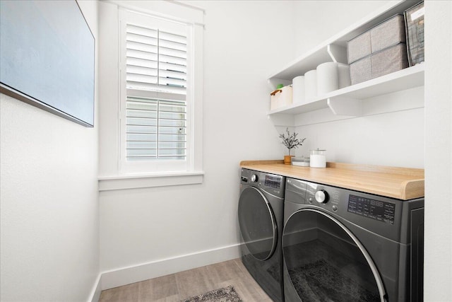 133 E Firethorn Cir, Inlet Beach, FL 32461 - laundry area with washing machine and clothes dryer and light wood-style flooring