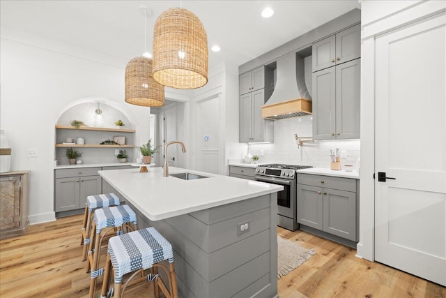 133 E Firethorn Cir, Inlet Beach, FL 32461 - kitchen featuring gray cabinets, stainless steel gas stove, custom exhaust hood, light countertops, and recessed lighting