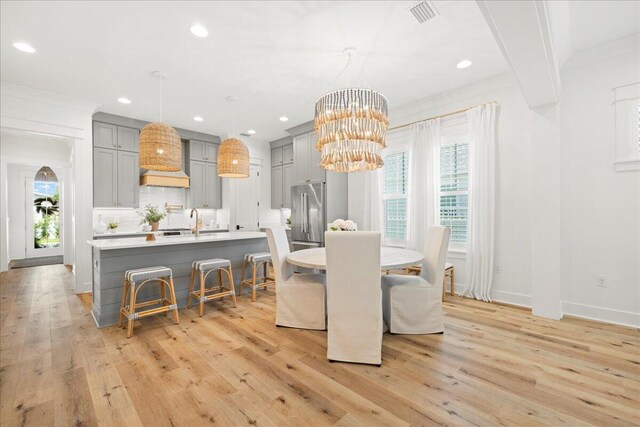 133 E Firethorn Cir, Inlet Beach, FL 32461 - dining room with light wood finished floors, a chandelier, and recessed lighting