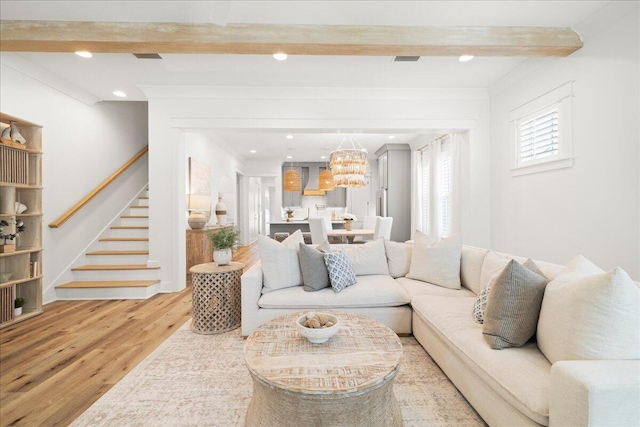 133 E Firethorn Cir, Inlet Beach, FL 32461 - living area featuring light wood-type flooring, stairs, beamed ceiling, a chandelier, and recessed lighting