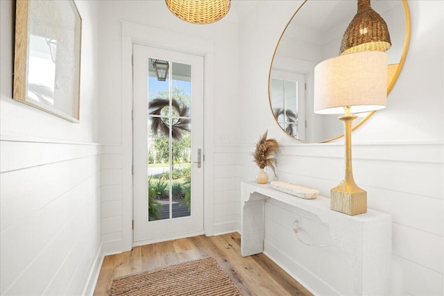 133 E Firethorn Cir, Inlet Beach, FL 32461 - doorway to outside featuring wood finished floors