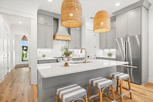 133 E Firethorn Cir, Inlet Beach, FL 32461 - kitchen featuring high end fridge, gray cabinetry, custom range hood, light countertops, and recessed lighting