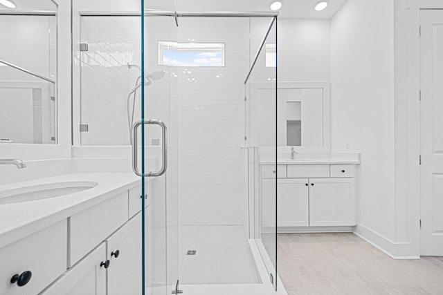 128 Ravine Rd, Watersound, FL 32461 - full bath with vanity, a stall shower, and recessed lighting