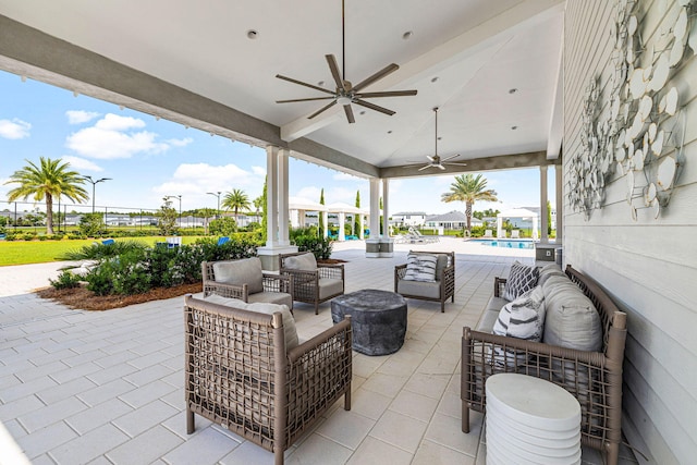 128 Ravine Rd, Watersound, FL 32461 - view of patio with outdoor lounge area, ceiling fan, and an outdoor pool