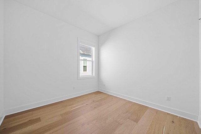 128 Ravine Rd, Watersound, FL 32461 - spare room with light wood-type flooring and baseboards