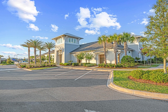 128 Ravine Rd, Watersound, FL 32461 - view of building exterior with uncovered parking