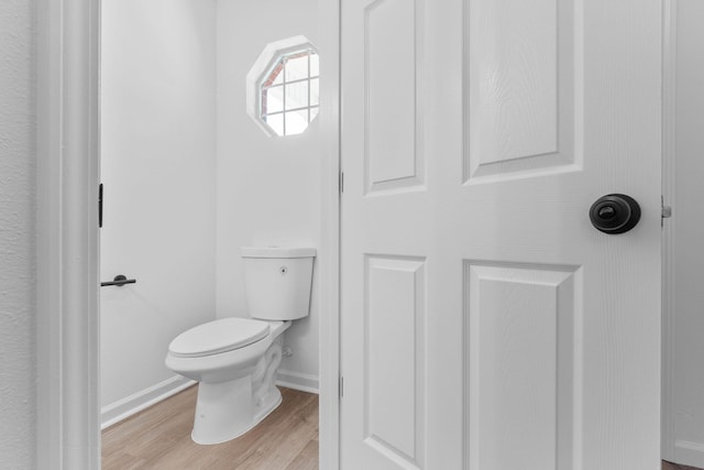 222 Swaying Pine Ct, Crestview, FL 32539 - bathroom with wood finished floors and toilet