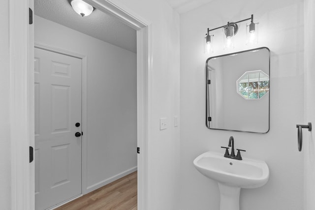 222 Swaying Pine Ct, Crestview, FL 32539 - bathroom with wood finished floors and a sink