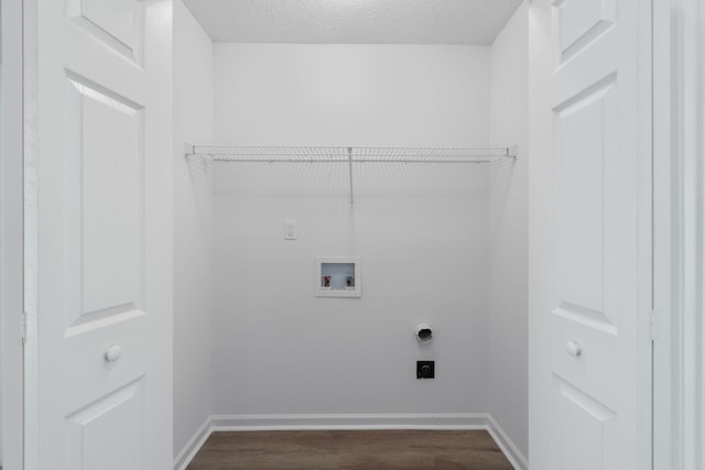 222 Swaying Pine Ct, Crestview, FL 32539 - washroom featuring hookup for a washing machine, hookup for an electric dryer, dark wood finished floors, and a textured ceiling