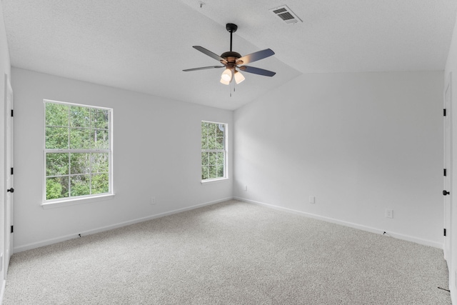 222 Swaying Pine Ct, Crestview, FL 32539 - unfurnished room with plenty of natural light, ceiling fan, carpet flooring, and vaulted ceiling
