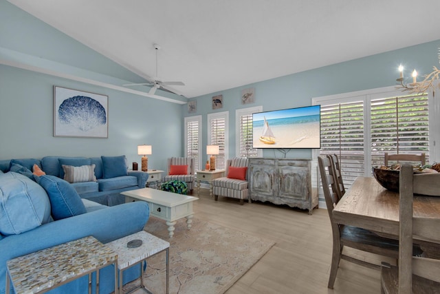 4460 Ocean View Dr, Destin, FL 32541 - living area with vaulted ceiling, ceiling fan, plenty of natural light, and light wood-style floors