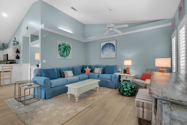 4460 Ocean View Dr, Destin, FL 32541 - living area with a ceiling fan, light wood-style floors, and high vaulted ceiling