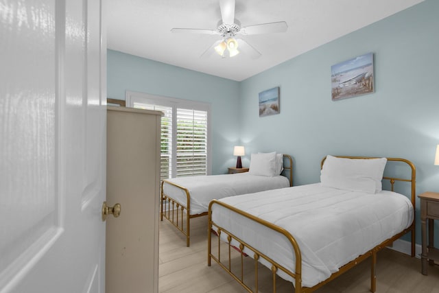 4460 Ocean View Dr, Destin, FL 32541 - bedroom featuring light wood finished floors and a ceiling fan