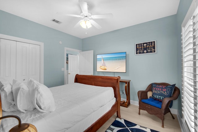 4460 Ocean View Dr, Destin, FL 32541 - bedroom with a closet, wood finished floors, and ceiling fan