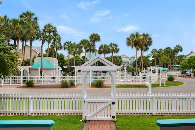 4460 Ocean View Dr, Destin, FL 32541 - view of community with a fenced front yard and a gate