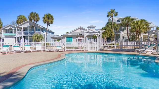 4460 Ocean View Dr, Destin, FL 32541 - community pool with a pergola and a patio area