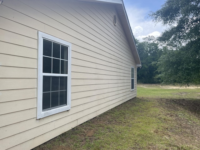 159 Michigan Ln, Defuniak Springs, FL 32433 - view of property exterior featuring a yard
