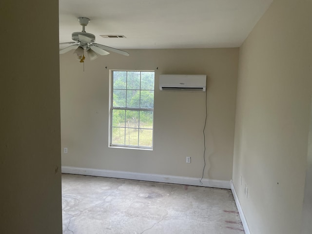159 Michigan Ln, Defuniak Springs, FL 32433 - unfurnished room featuring a wall mounted AC, a ceiling fan, and concrete floors