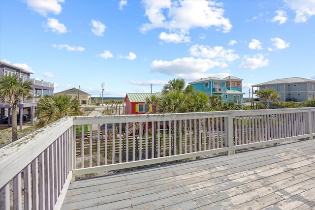 8147 White Sands Blvd, Navarre, FL 32566 - wooden terrace featuring a residential view