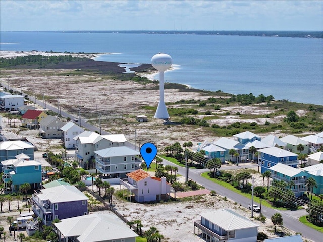 8147 White Sands Blvd, Navarre, FL 32566 - aerial view of residential area with a nearby body of water